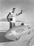 1965_George_Roeder_breaks_the_land_speed_record_@_177_mph_in_a_Streemliner_250cc.jpg
